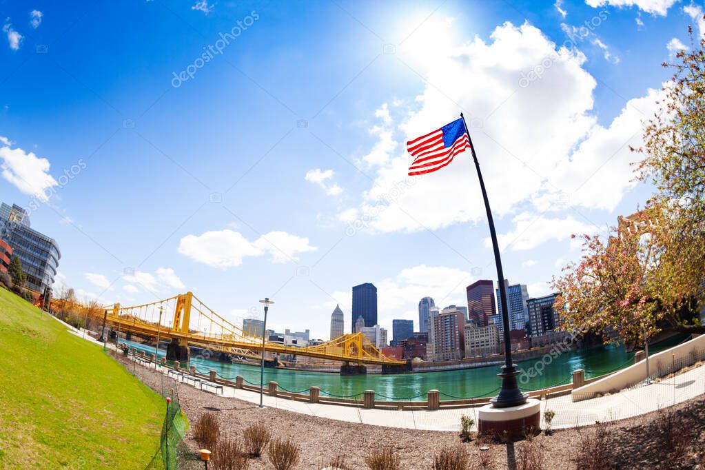 US national flag in Roberto Clemente Memorial Park on Ohio river waterfront, Pittsburg, Pennsylvania, USA