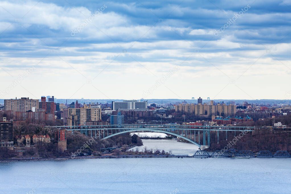 View of Henry Hudson Bridge and Bronx over river from Englewood Cliffs