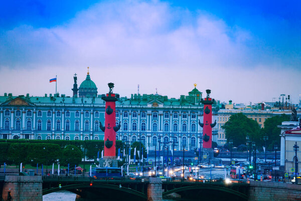 Rostralnaya Kolonna or column on Neva river over Winter Palace, Zimnij dvorets in Saint Petersburg, Russia