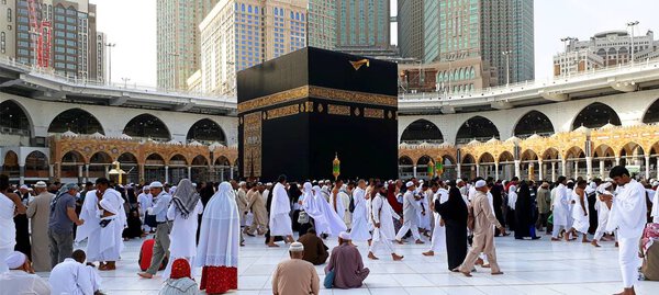 MAKKAH, SAUDI ARABIA - FEBRUARY 10, 2017:Muslim pilgrims from all over the world gathered to perform Umrah at the Al- Haram Mosque in Mecca. A crowd of pilgrims circumabulate (tawaf) Kaaba.