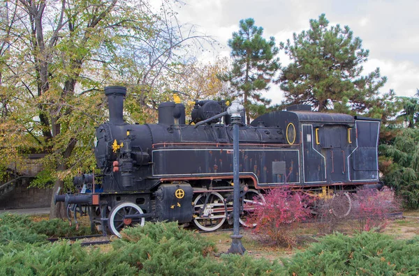 An old steam locomotive, a museum exhibit on the plateau in front of the railway station in Novi Sad, Serbia.For the first time it passed through Novi Sad in 1882