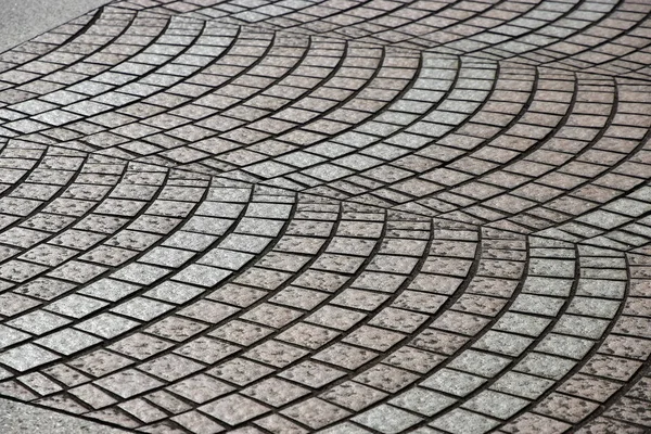 The ground of the design of the stone pavement of the daytime park