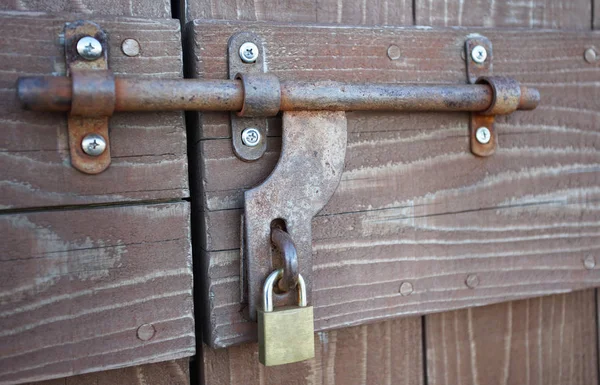 Locking of wooden board door