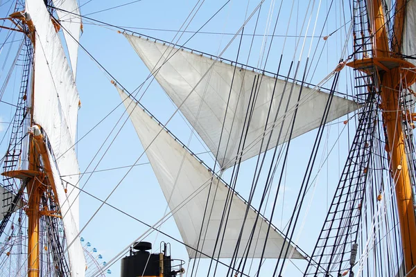 Three angles of sail and ropes of the sailing boat of the day when it was fine