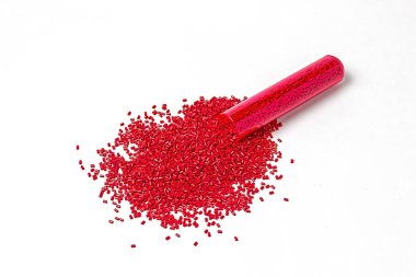 Polymeric dye. Plastic pellets. Colorant for plastics. Pigment in the granules. clipart