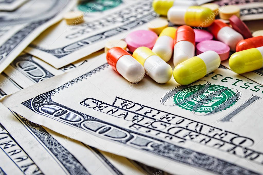 Expensive medicine. Medical insurance. Drug addiction. Money and pills.