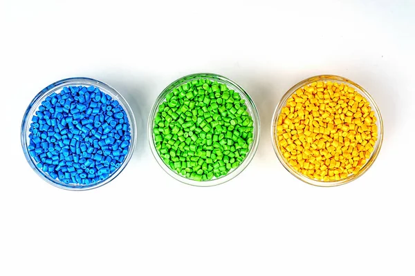 Polymeric dye. Plastic pellets. Colorant for plastics. Pigment in the granules — Stock Photo, Image