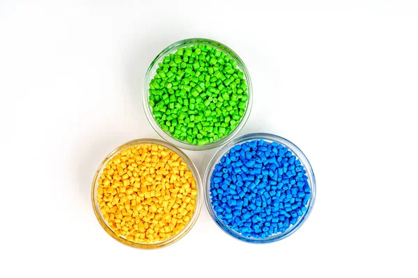 Polymeric dye. Plastic pellets. Colorant for plastics. Pigment in the granules. Stock Photo