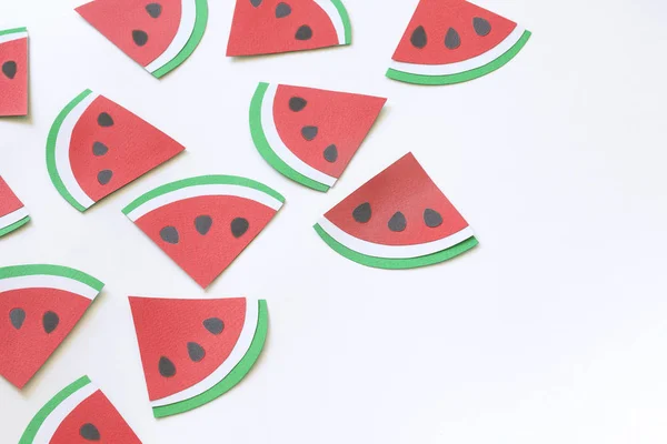 Watermelon slices Paper cut isolated on white background. Summer concept with text space for banner or poster. Paper craft. Flat lay.