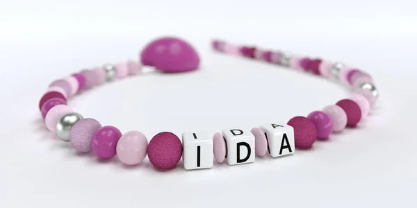 A rózsaszín cumi lánc lányok neve Ida — Stock Fotó