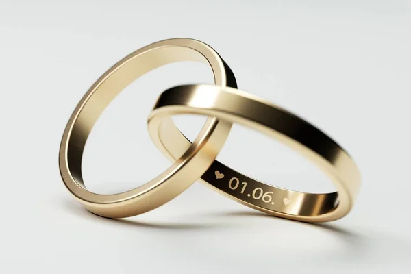 Anéis de casamento dourados isolados com data 1. Junho — Fotografia de Stock
