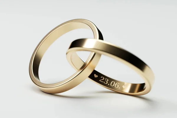 Isolated golden wedding rings with date 23. June — Stock Photo, Image