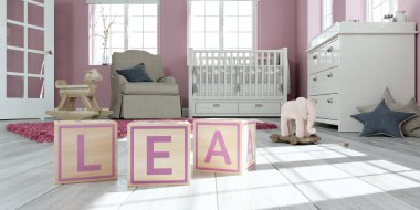 Çocuk odasında ahşap oyuncak küpleriyle yazılı adı lea