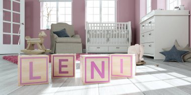 Çocuk odasında ahşap oyuncak küpleriyle yazılı adı leni