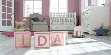 Adı çocuk odasında ahşap oyuncak küpleriyle yazılı Ida