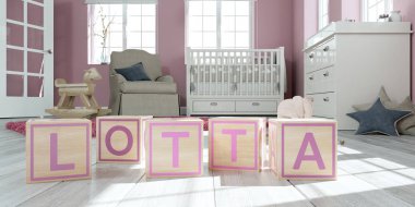 Çocuk odasında ahşap oyuncak küpleriyle yazılı adı lotta