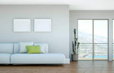 Gri bir duvar önünde beyaz kanepe ile parlak Oda