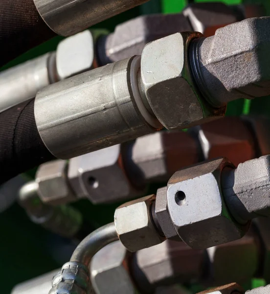 pipes and metal fastenings of pneumatic system, details of agricultural machinery