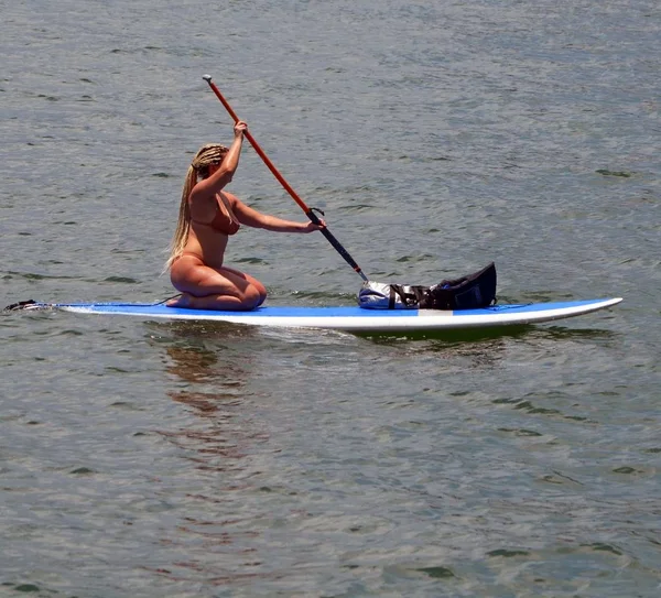 Sensuous Lady Long Braided Blond Hair Rowing Paddle Board Kneeling — Stock Photo, Image