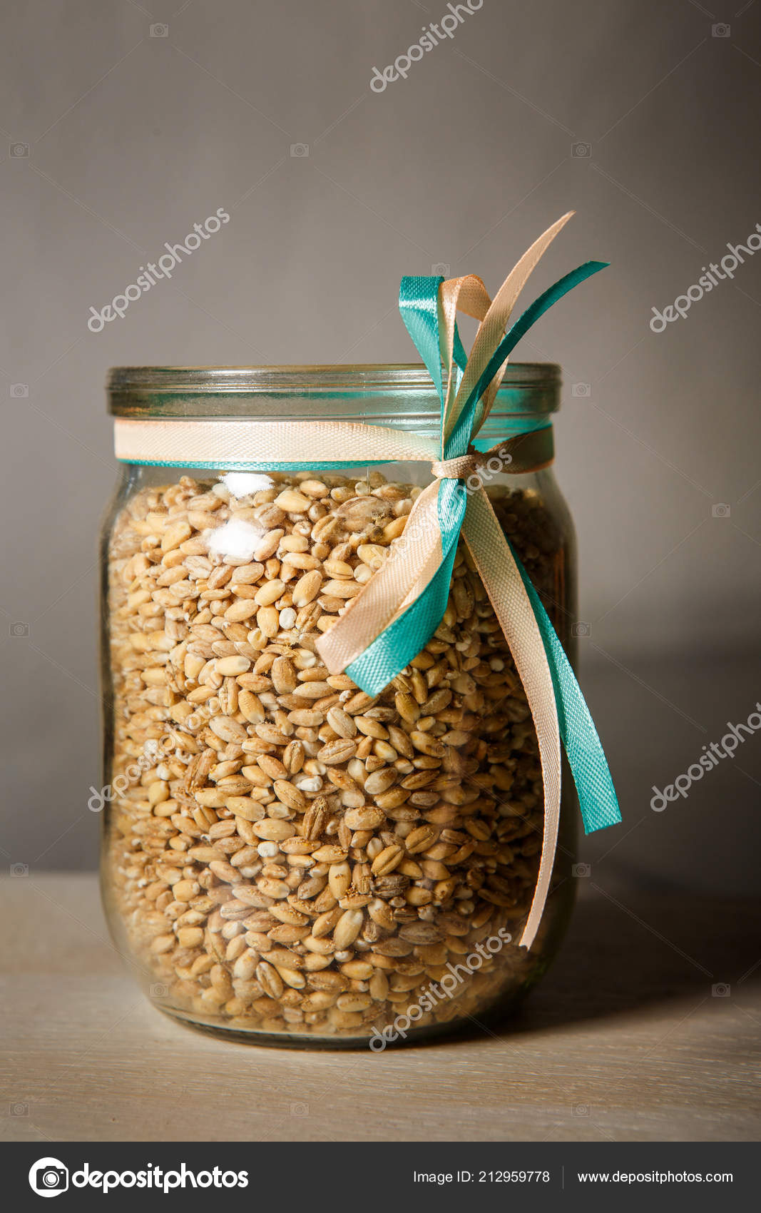 Opened Glass Jar Decorated White Blue Ribbons Filled Wheat