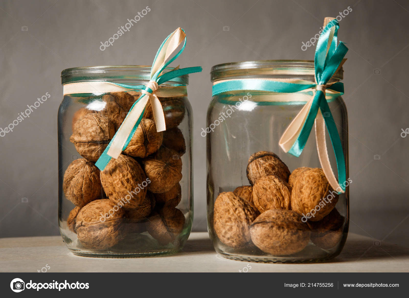 Two Glass Jars Filled Whole Walnuts Decorated Blue White Ribbons