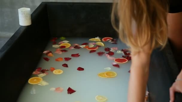 Closeup Woman Hands Mix Citrus Slices Rose Petals Hot Milk — Stock Video