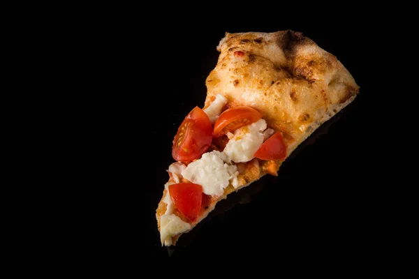Top view closeup piece of pizza with tomatoes and mozzarella — Stock Photo, Image