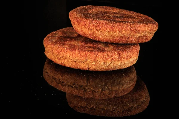 Closeup two whole round roasted homemade cereal flapjacks — Stock Photo, Image