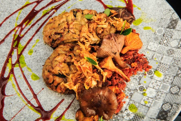 top view closeup animal brain with mushrooms and meat