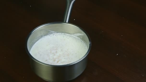 Top View Closeup Small Metal Saucepan Boiled Milk Dry Yeast — Stock Video