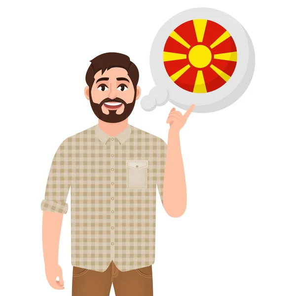 Feliz hombre barbudo dice o piensa en el país. Macedonia del Norte, icono del país europeo, viajero o turista. Ilustración vectorial — Vector de stock