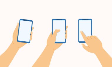 El telefonu tutar, basar ve parmağını cep telefonuna doğrultur.