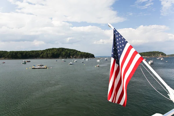 Bar Harbor view with american flag on foreground