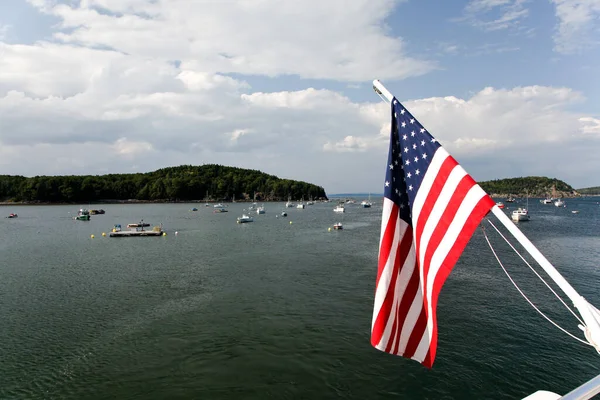 American flag with Bar Harbour view