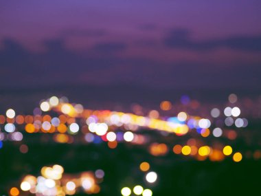    Bulanık hareketli şehir ışığı arka planı. Bokeh 'in odaklı olmayan ışıklarla soyut arkaplan.
