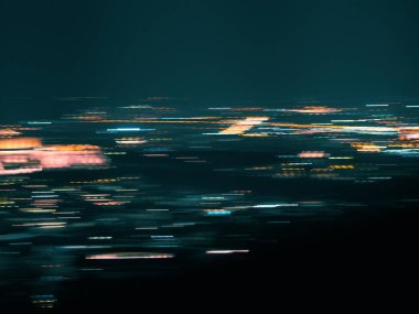 Bulanık hareketli şehir ışığı arka planı. Bokeh 'in odaklı olmayan ışıklarla soyut arkaplan.
