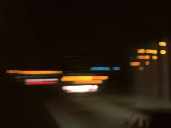 Road lights.Blurred motion travel  light background.Abstract background with bokeh defocused lights.