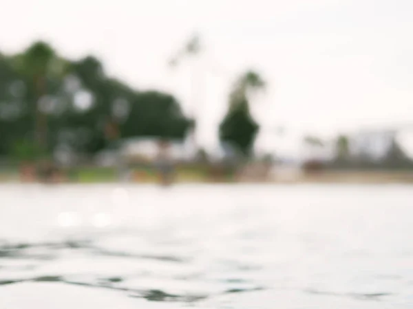 Mare sfocato e sfondo spiaggia . — Foto Stock