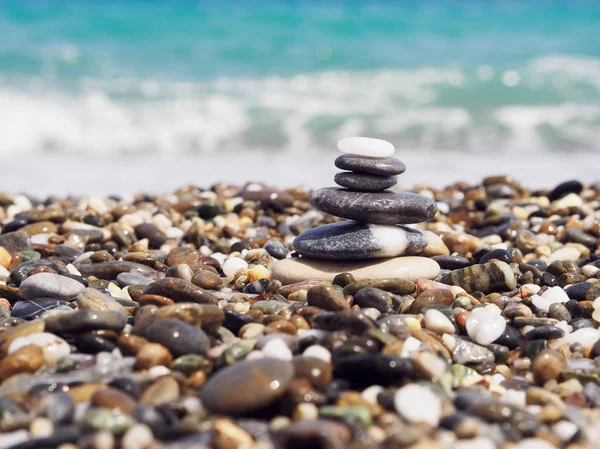 Sea stones and blue sea background.Sunny day. — Stock Photo, Image