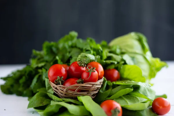 Lots of fresh ingredients for making salad. Vegetables are on the table — Stock Photo, Image