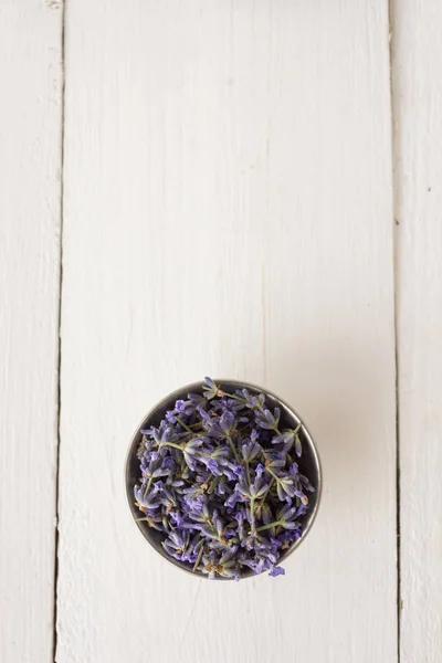 Top view in the saw lies freshly cut lavender for an aroma spa procedure. — Stock Photo, Image