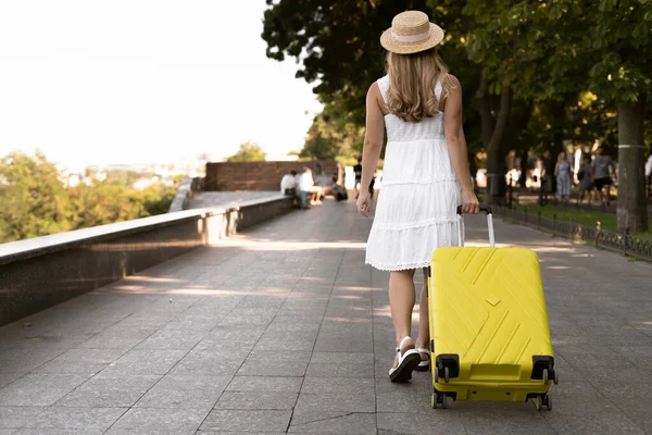 Beautiful Tourist Girl Travels Yellow Suitcase Park Copy Space — Stock Photo, Image