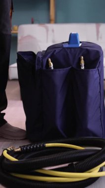 Dry washing service concept. Dry-cleaner preparing Cleaning equipment to maintain tidiness at home. close-up