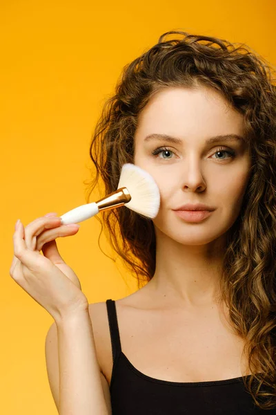 Closeup Portrait Beautiful Female Curly Hair Holding Makeup Brush Isolated — Stock Photo, Image