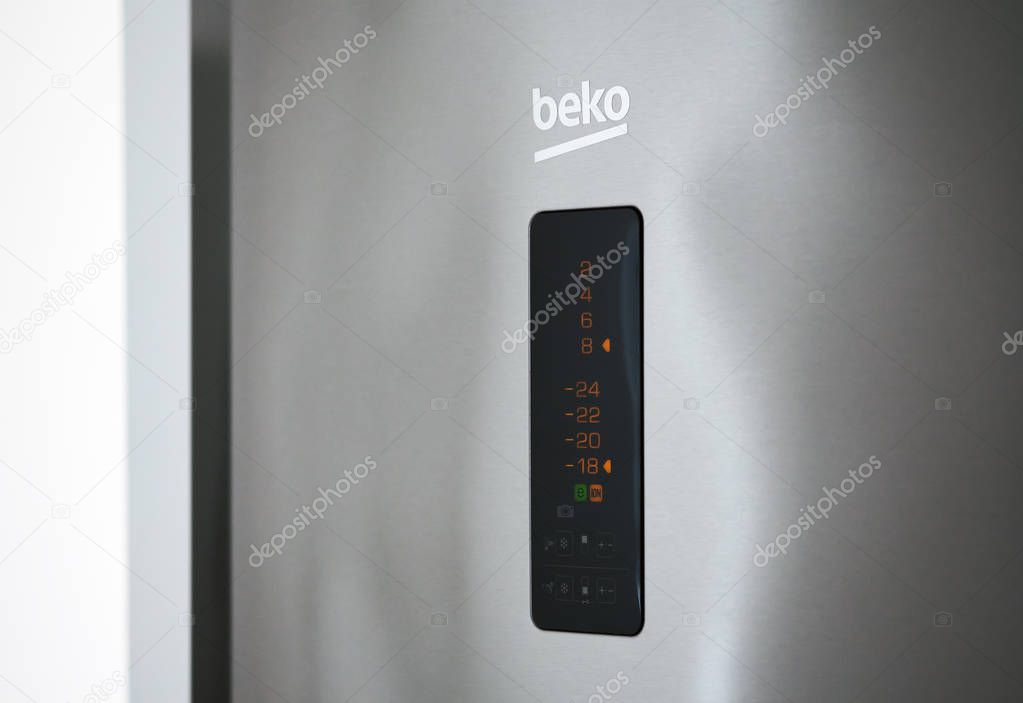Alicante, Spain - December 7, 2019: Close up of digital numbers electronic display stainless steel Beko smart refrigerator, modern technology, professional design, energy efficiency