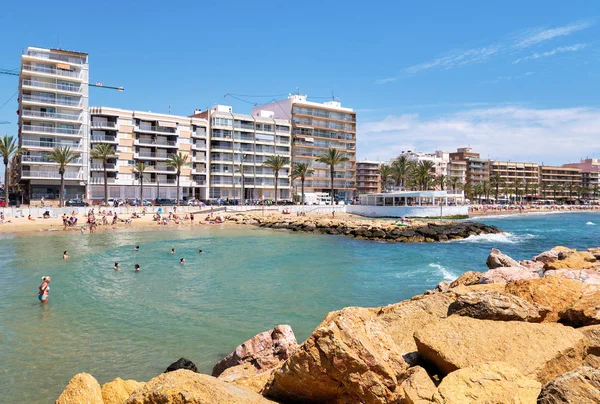 Personer på Playa del Cura strand — Stockfoto