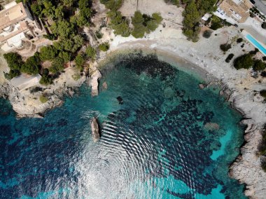 Cala en Cranc rocky seaside in the Palma de Mallorca  clipart