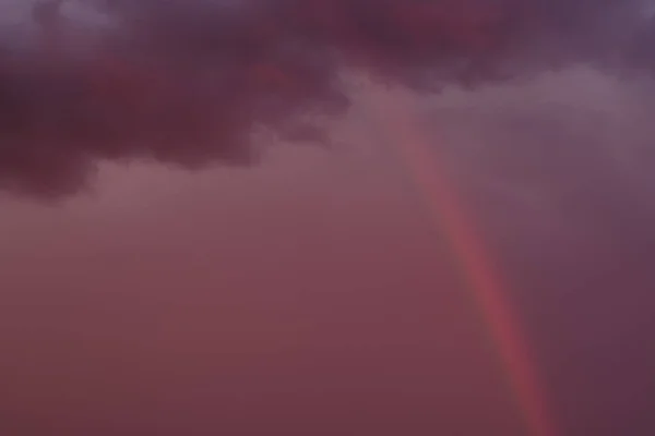 Full frame nature cloudy sky background with rainbow — Stock Photo, Image