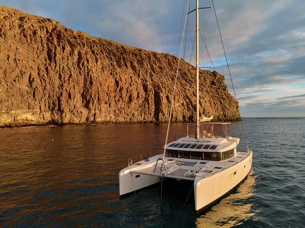 Moored lonely modern catamaran in calm waters of Atlantic Ocean — Stock Photo, Image