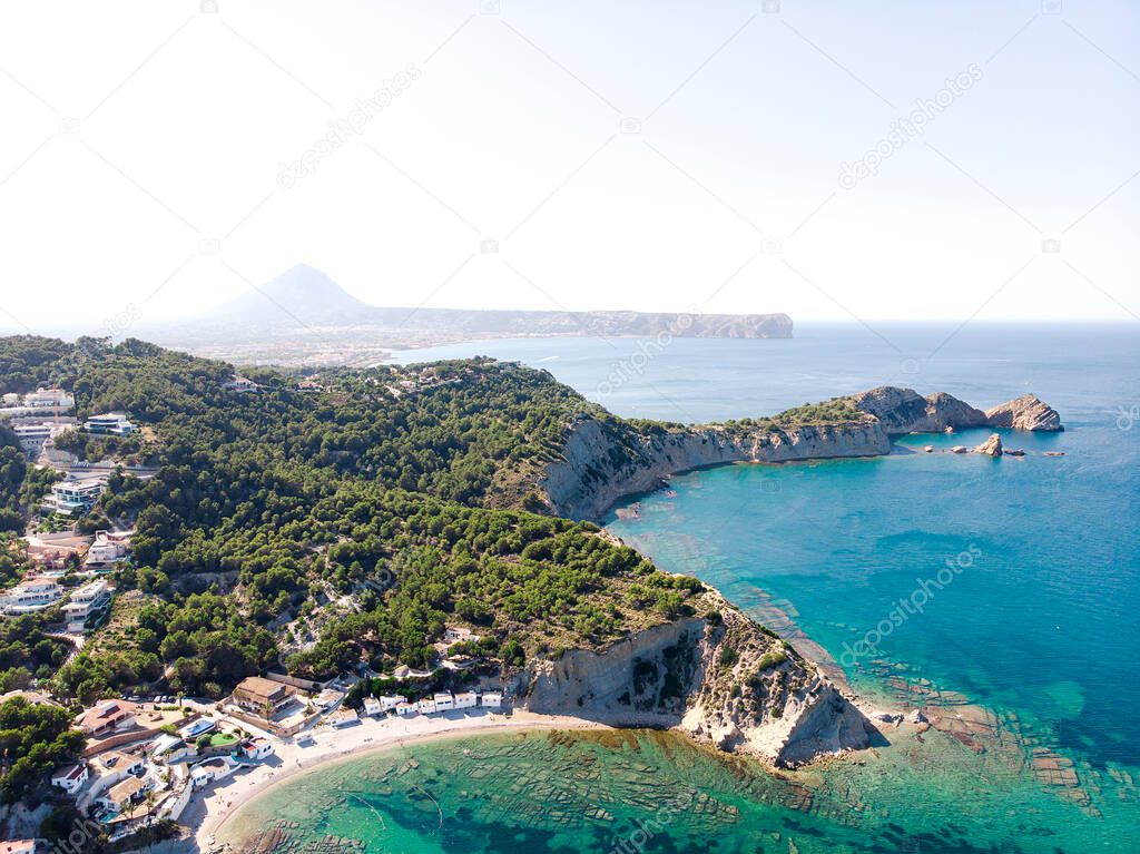 Aerial view rocky green mountains of Javea. Costa Blanca, Province of Alicante. Spain